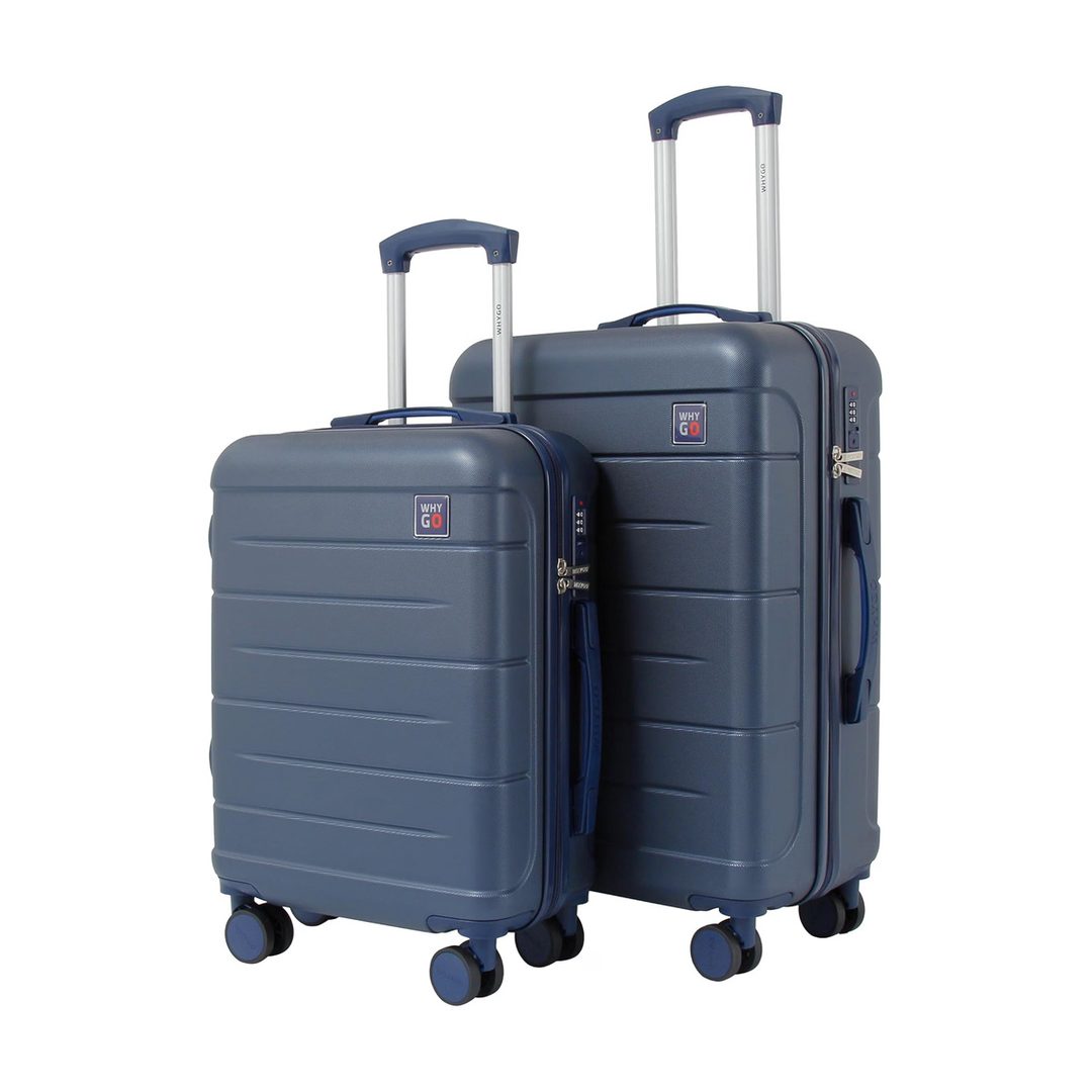 Due valigie rigide blu con ruote