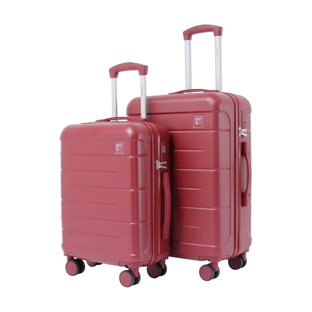 Due valigie rigide rosse con ruote